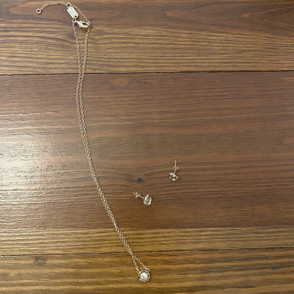 Coach rose gold necklace with matching earrings